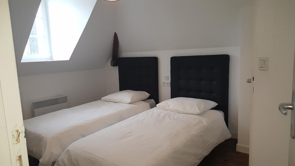 Au Pigeon Blanc Hotel Andouillé Eksteriør billede